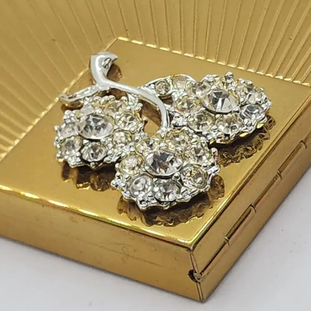 Vintage Volupte Rhinestone Flower Powder Compact Gold Tone Sunburst Mirror